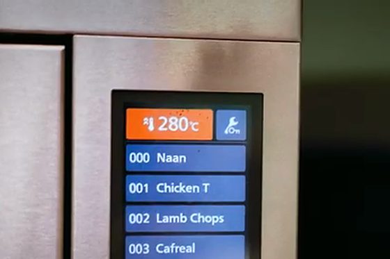 The SCV3 touchscreen showing Café Spice Namasté's saved programmes